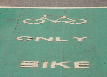 green bicycle lane, designed to make cycling saferの写真素材