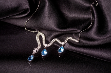 Beautiful bijouterie on black backgroundの写真素材