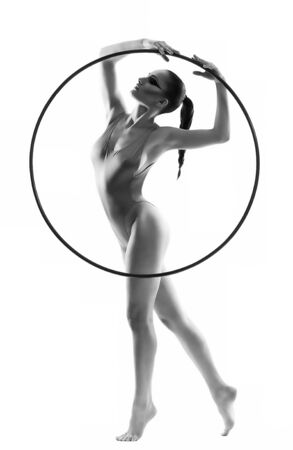 Beautiful young woman gymnast with   hoopの写真素材