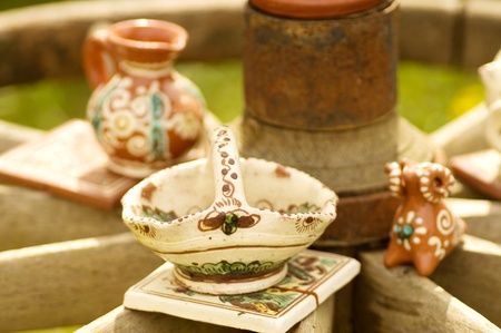 Folk clay tableware with ornateの写真素材