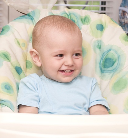 Sweet little baby smiling and lookingの写真素材