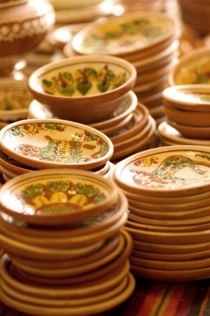 Folk clay tableware with ornateの写真素材