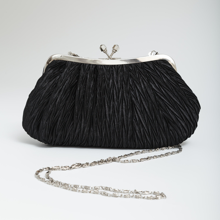 Black shoulder clutch back isolated on whiteの写真素材