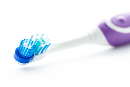 Electric toothbrush isolated on a white の写真素材