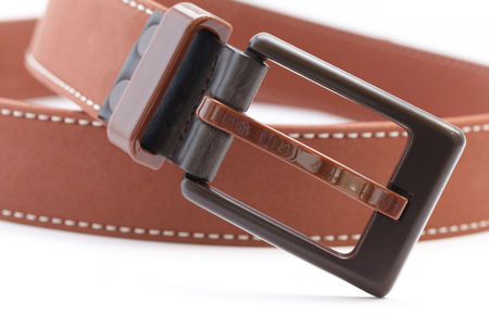 used belt, brown, isolated on white backgroundの写真素材