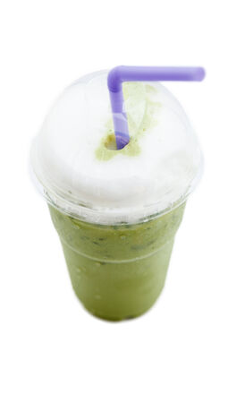 ice green tea with whipped cream isolated on whiteの写真素材