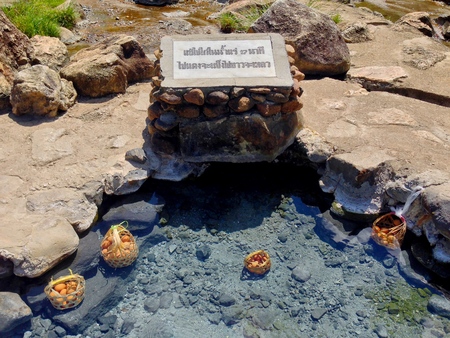 Chicken eggs in wood basket boiled at Chaeson hot spring, Chiang mai, Thailand.の写真素材