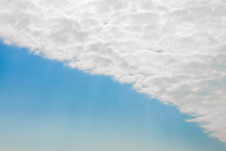 Beautiful fluffy white clouds or Altocumulus in the form Contrail or Straight line with blue sky,...