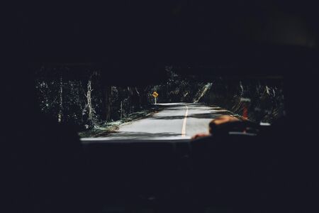 View from the car of Road in Forest at mountain of Route between Chiang Mai to Pai, Mae Hong Son. Moody tone.の写真素材