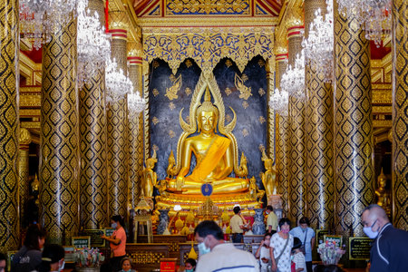 Phitsanulok, Thailand - July 04 2020: Many people worship the Phra Buddha Chinnarat at Phra Si...