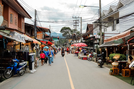 Mae Hong Son, Thailand - August 17 2019: Many people walk on the road at Pai walking street for buy products and eat street food in famous. Popular tourist attraction.のeditorial素材