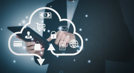 Cloud computing technology concept. Internet storage network system. Bigdata and business. Man wearing black suit and Finger touch tablet.の写真素材