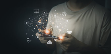Businessman hand search for information with hologram via smartphone. Planning and strategy concept....