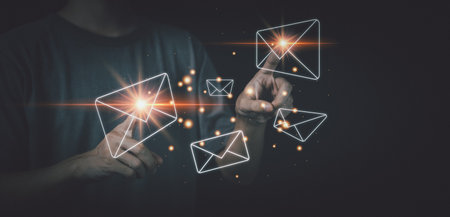 Man touching message notification with hologram. Social media and digital online concept.の写真素材