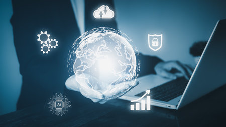 Hand of man hold virtual global with hologram using metaverse and internet connection on notebook (Laptop). Business technology link digital marketing. Big data and Financial banking.の写真素材