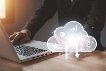 Cloud computing technology on hand of businessmen and using notebook (Laptop). Internet storage...