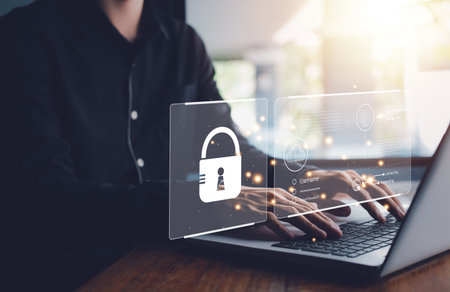Username and password (Login) for technology cyber security internet and networking system. Businessman hand typing notebook (Laptop). Encryption, biometric identification fingerprint scanner.の写真素材