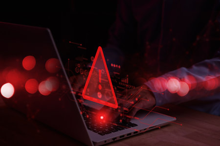 System hacked warning alert on notebook (Laptop). Cyber attack on computer network, Virus, Spyware, Malware or Malicious software. Cyber security and cybercrime. Compromised information internet.の写真素材