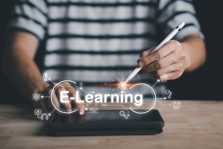 E-Learning concept, Man hand typing tablet and smartpen with webinar online, Education learn on...