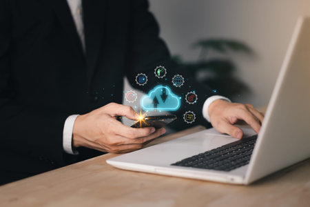 Cloud computing technology concept with businessman and smartphone, notebook (Laptop). Big data...