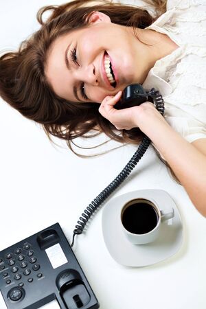 Portrait of smiling business woman on phone callの写真素材