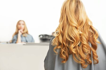 Blonde Hair Woman in hair salonの写真素材