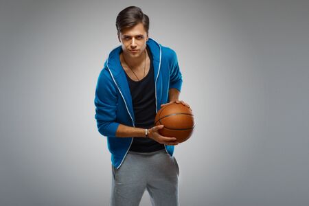 Portrait of a young man basketball playerの写真素材