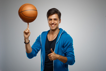 Portrait of a young man basketball playerの写真素材