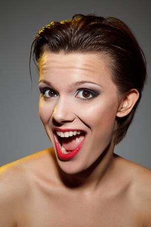 bright picture of surprised womanの写真素材