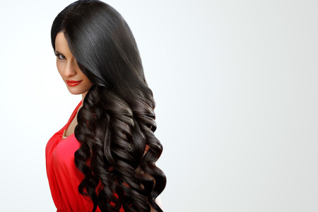Portrait of Beautiful Woman with Black Wavy Hair Portrait of Beautiful Woman with Black Wavy Hair