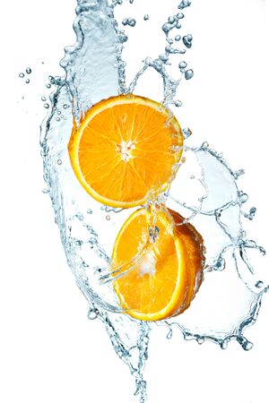 Juicy Orange with water splash on white backgroundの写真素材