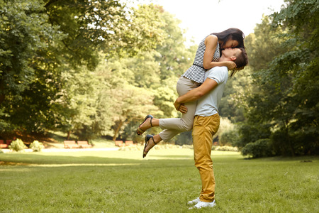 Couple in Love. Happy couple kissing in the park.の写真素材