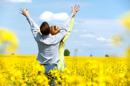 Portrait of attractive young couple in love outdoors. Love and freedomの写真素材