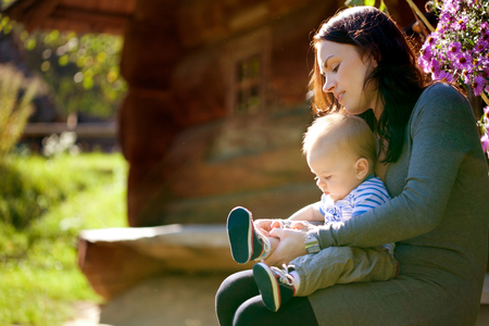 Happy family.A young mother and babyの写真素材