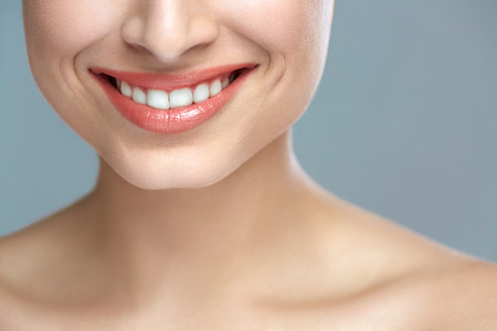 Woman smile. Teeth whitening. Dental care.の写真素材