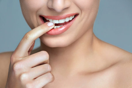 Woman smile. Teeth whitening. Dental care.