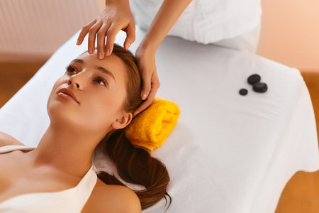 Face Spa. Close Up Portrait Of Beautiful Healthy Young Woman During Facial Massage With Rejuvenating, Moisturizing, Refreshing, Regenerative, Anti-aging Cream In  Beauty Cosmetology Esthetics Medical Spa Salon Or Clinic. Face Treatment, Aromatherapy, Skinの写真素材