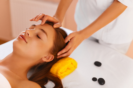 Face Care. Skin Treatment, Recreational Procedure. Portrait Of Beautiful Healthy Young Woman During Facial Massage With  Rejuvenating, Moisturizing, Refreshing, Regenerative, Anti-aging Cream In Renew Beauty Cosmetology Esthetics Medical Spa Salon Or Clinの写真素材