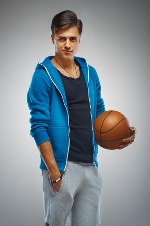 Portrait of a young man basketball playerの写真素材