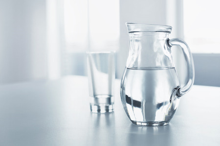 Water. Health And Diet Concept. Drinks. Woman's Hand Holding Glass Of Pure Water. Healthy Eating, Lifestyle. Healthcare And Beauty. Water. Health And Diet Concept. Drinks. Woman's Hand Holding Glass Of Pure Water. Healthy Eating, Lifestyle. Healthcare And Beauty.