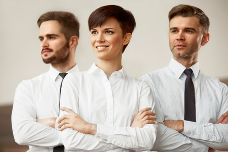 Business Team. Happy smiling people standing in officeの写真素材