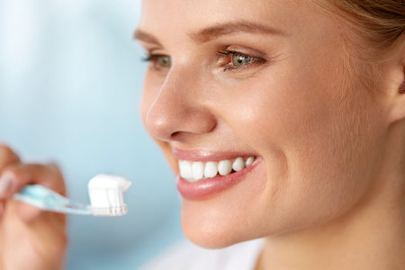 Healthy White Teeth. Closeup Portrait Of Beautiful Happy Smiling Woman With Fresh Perfect Smile...