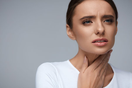 Throat Pain. Beautiful Woman Having Sore Throat, Feeling Sick. Unhappy Ill Female Suffering From...