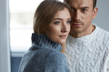 Couple In Love. Handsome Man And Beautiful Woman Close Up Portrait. Sensual Young Male Embracing Affectionate Female With Fresh Natural Makeup, Soft Face Skin. Romantic Relationships. High Resolutionの写真素材