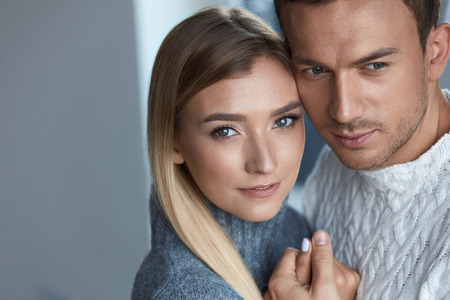 Couple In Love. Handsome Man And Beautiful Woman Close Up Portrait. Sensual Young Male Embracing Affectionate Female With Fresh Natural Makeup, Soft Face Skin. Romantic Relationships. High Resolutionの写真素材
