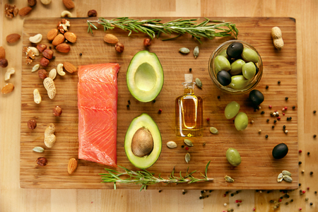 Healthy Nutrition. Products For Healthy Diet On Table. Composition Of Fresh Organic Food: Avocado, Olives, Nuts, Olive Oil, Salmon Fillet, Rosemary And Pumpkin Seeds. Balanced Diet. High Resolution.の写真素材