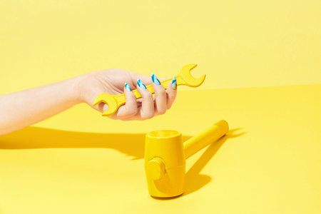 Nails Design. Hand With Colorful Nails On Yellow Background. Close Up Of Female Hands With Beauty...