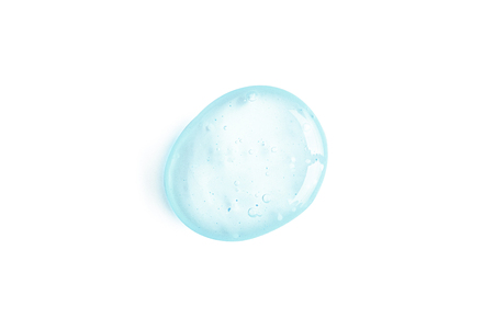 Cosmetic Cream Gel Texture Isolated On White Background. Close Up Of Blue Transparent Drop Of Skin Care Product. High Quality