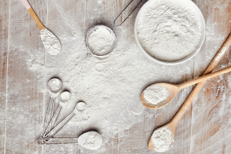 White Flour In Different Baking Tools In Kitchen On Wooden Table. High Resolutionの写真素材
