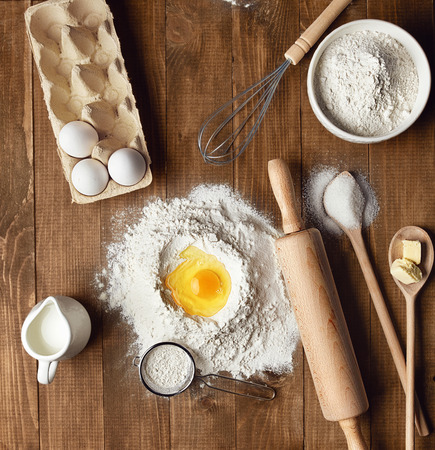Bakery Ingredients On Table. Close Up Of Food Ingredients For Baking On Wood Background. High Resolutionの写真素材